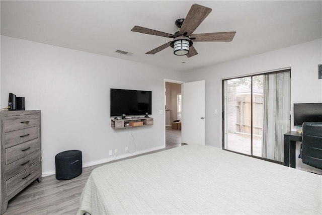 bedroom featuring light wood-type flooring, access to exterior, and ceiling fan