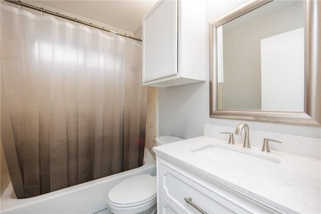 full bathroom featuring vanity, shower / tub combo with curtain, and toilet