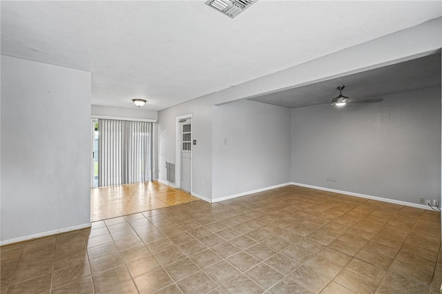 5725 Woodhaven Dr, Corpus Christi, TX 78412 - empty room with ceiling fan and tile patterned flooring