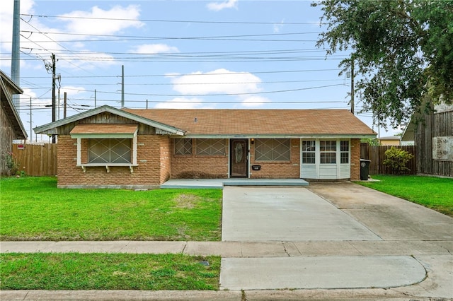 5725 Woodhaven Dr, Corpus Christi, TX 78412 - view of front of home featuring brick siding and driveway