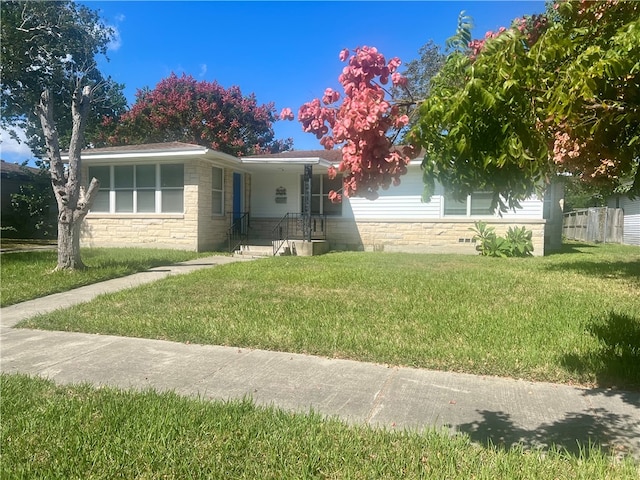 view of front of home with a front yard