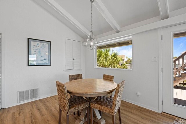 13 Sandpiper Ln, Rockport, TX 78382 - dining space featuring wood finished floors and stairway