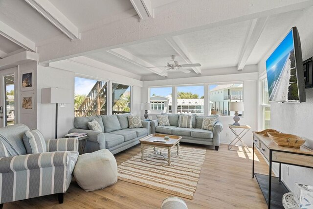 13 Sandpiper Ln, Rockport, TX 78382 - sunroom featuring beamed ceiling and plenty of natural light