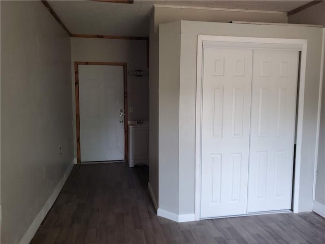 4413 N Cornelia Cir, Corpus Christi, TX 78408 - corridor with dark wood-style floors, baseboards, and crown molding
