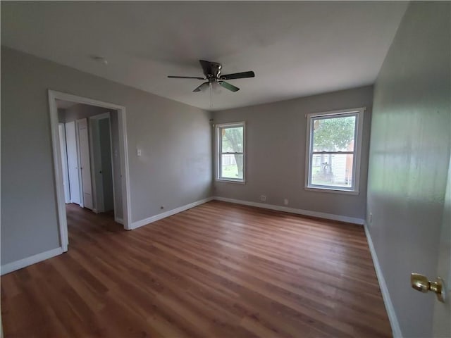 4413 N Cornelia Cir, Corpus Christi, TX 78408 - spare room featuring healthy amount of natural light, baseboards, and wood finished floors