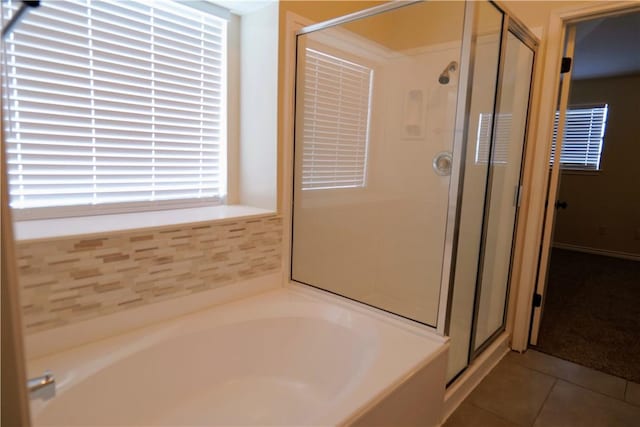 3022 Chapel Creek Dr, Corpus Christi, TX 78414 - full bath featuring a stall shower, a garden tub, and tile patterned floors