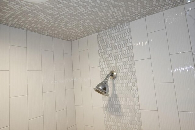 details featuring a tile shower