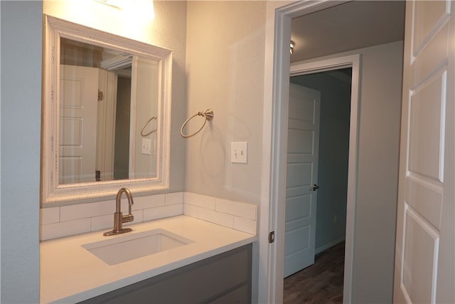 bathroom featuring wood-type flooring and vanity