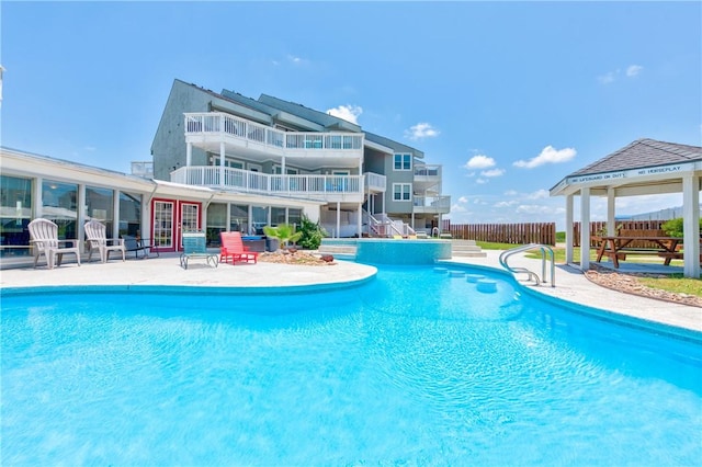 view of pool featuring a gazebo and a patio area