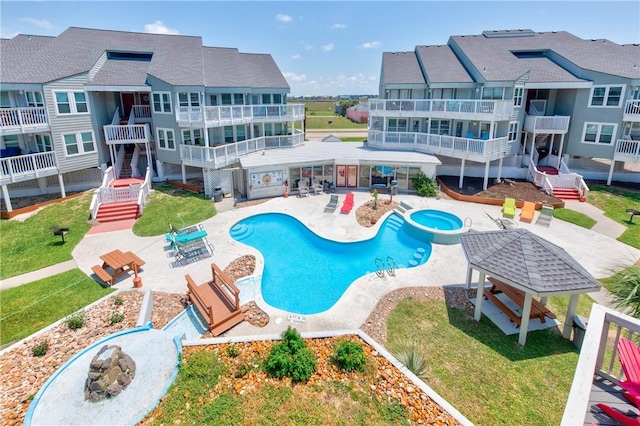 view of pool with a gazebo and a patio area