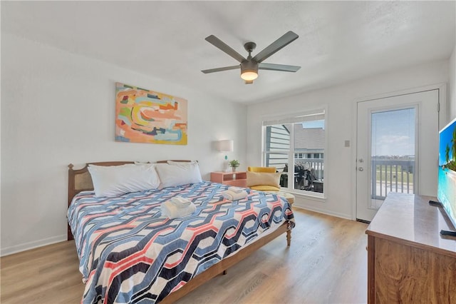 bedroom with access to outside, ceiling fan, and light hardwood / wood-style floors