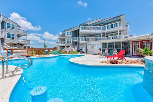 view of pool featuring a patio area