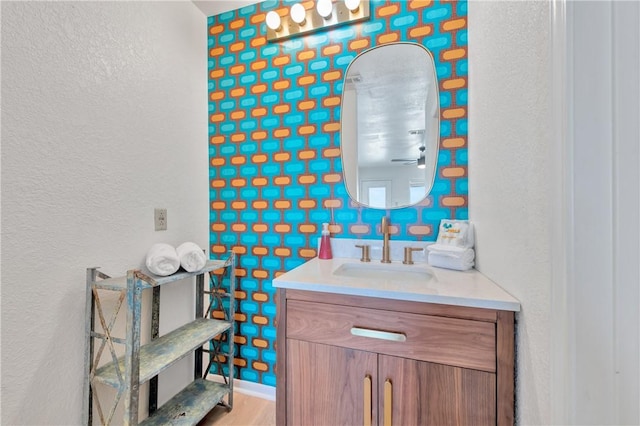 bathroom featuring vanity and wood-type flooring