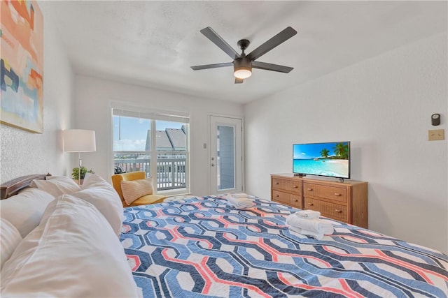 bedroom featuring access to exterior and ceiling fan