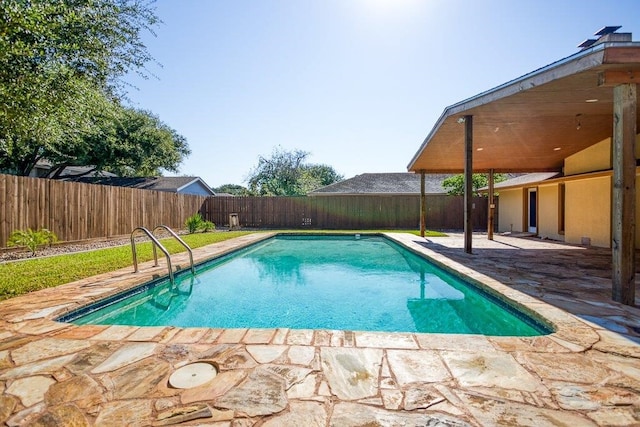 view of swimming pool featuring a patio