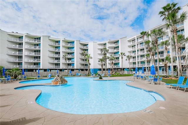 view of pool featuring a patio