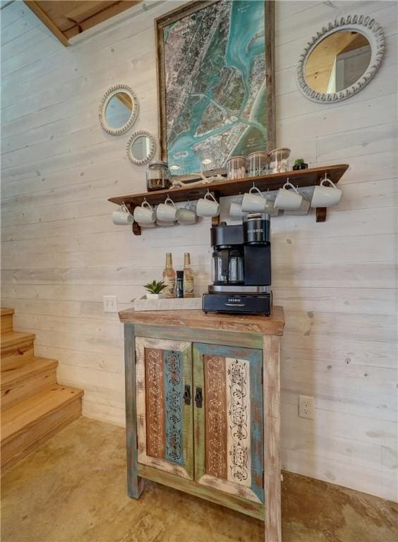 bar featuring wood walls