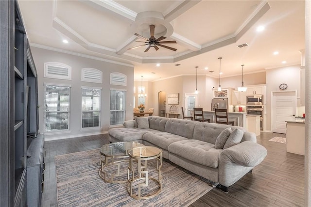 living room with ceiling fan, arched walkways, coffered ceiling, visible vents, and dark wood finished floors