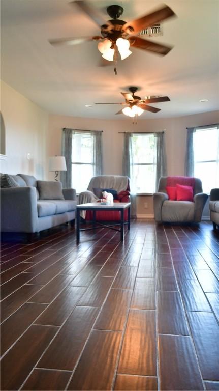 living room featuring dark hardwood / wood-style floors