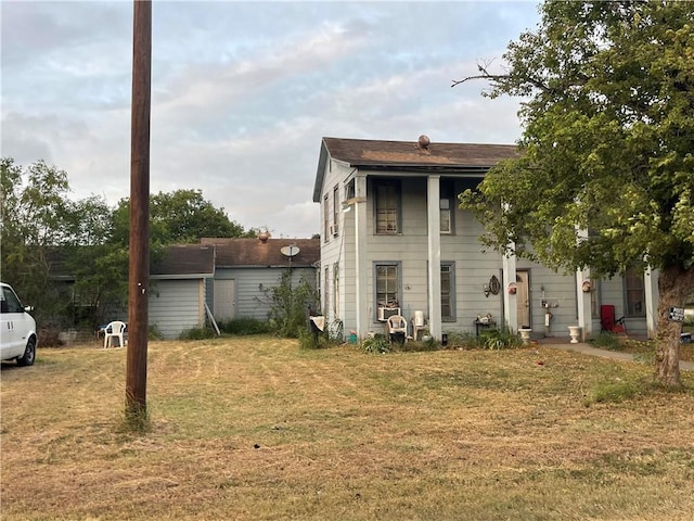 exterior space with a front yard