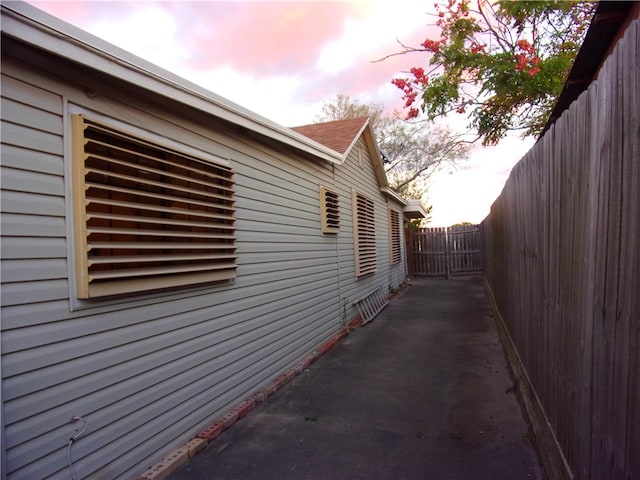 view of property exterior at dusk