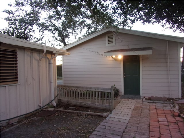 entrance to property with a patio