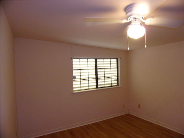 unfurnished room featuring ceiling fan and wood-type flooring