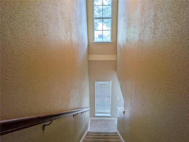 6702 Everhart Rd Unit 104, Corpus Christi, TX 78413 - stairway with a textured wall and carpet