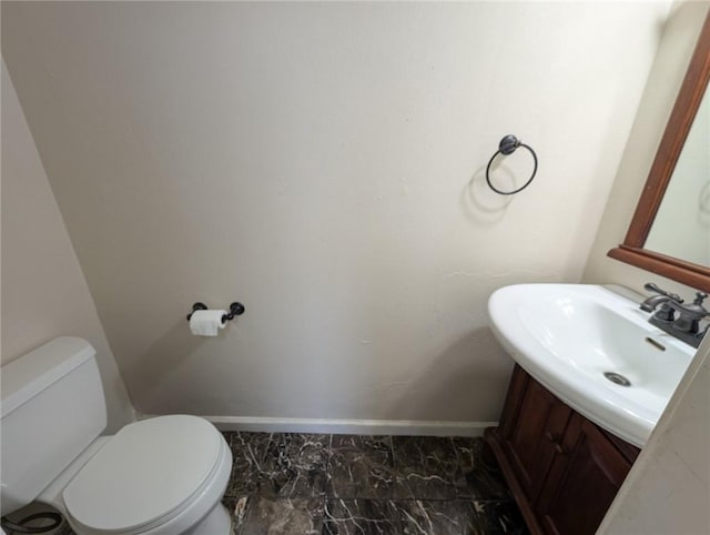 6702 Everhart Rd Unit 104, Corpus Christi, TX 78413 - half bathroom featuring vanity and marble finish flooring