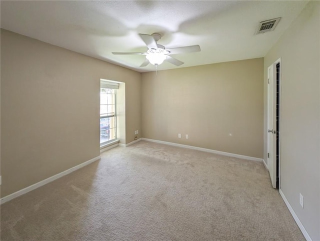6702 Everhart Rd Unit 104, Corpus Christi, TX 78413 - spare room with a ceiling fan and light carpet