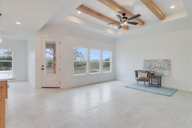 unfurnished room with beamed ceiling, light tile patterned floors, and ceiling fan