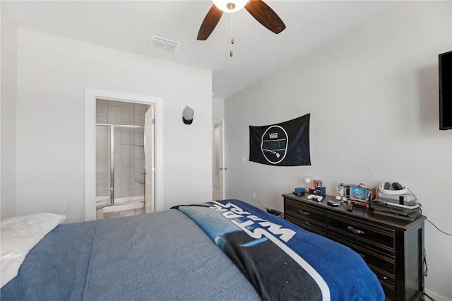 bedroom with ensuite bathroom and ceiling fan