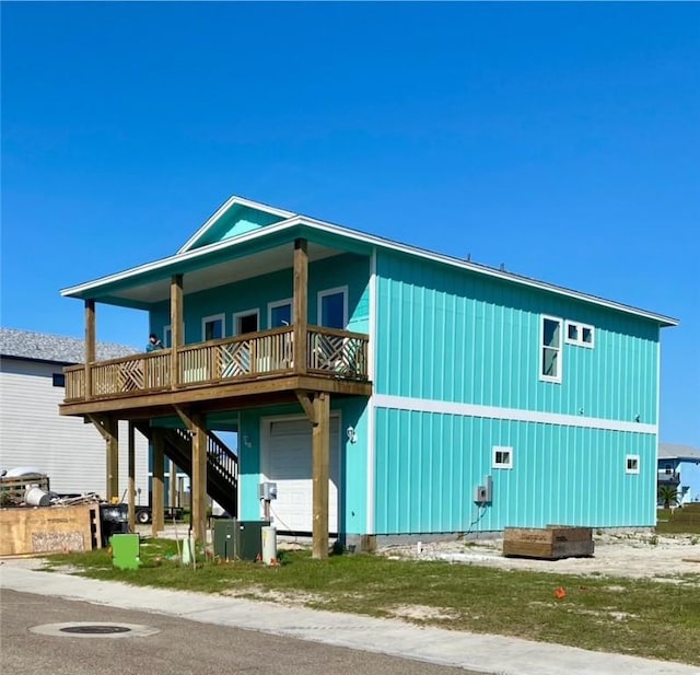 exterior space featuring board and batten siding and a garage