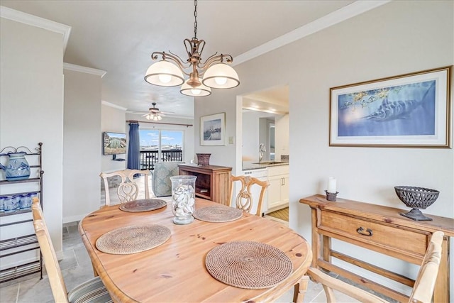 dining room featuring ornamental molding and ceiling fan with notable chandelier