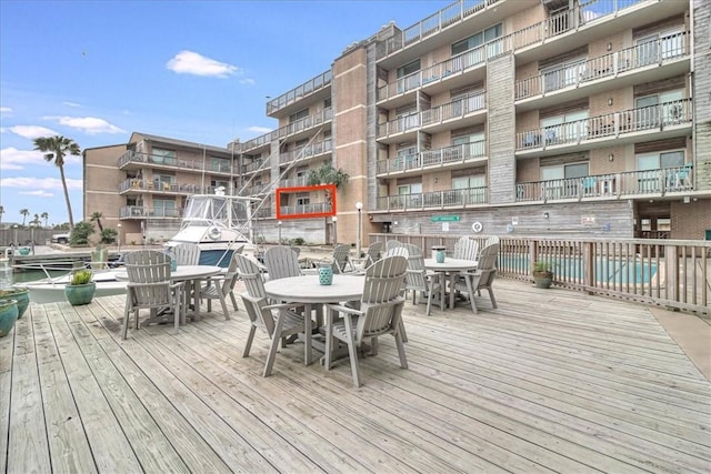 deck with outdoor dining space