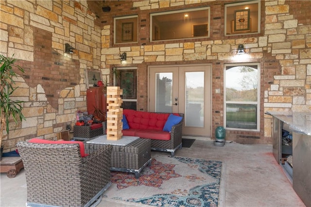 view of patio with outdoor lounge area and french doors