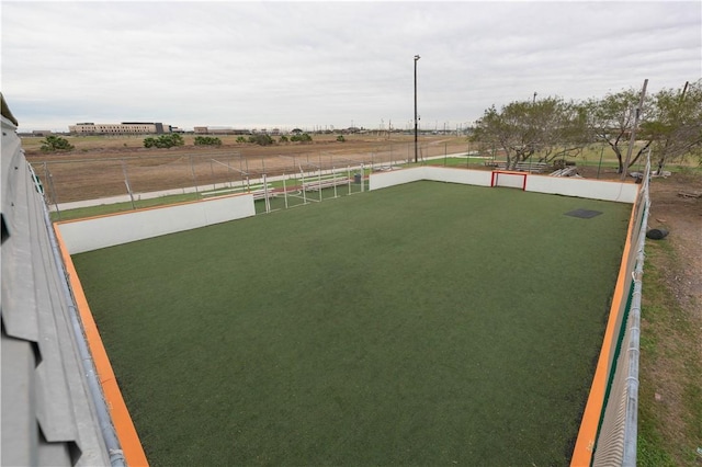 view of yard with a rural view