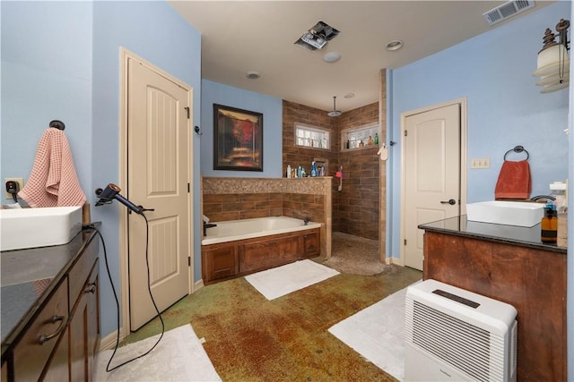 bathroom with separate shower and tub and sink