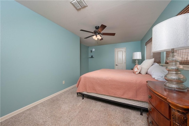 bedroom with ceiling fan and carpet floors