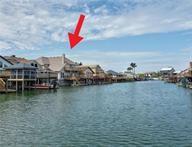 15230 Isabella Ct, Corpus Christi, TX 78418 - water view featuring a boat dock