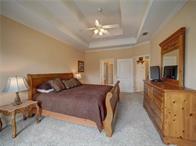 15230 Isabella Ct, Corpus Christi, TX 78418 - bedroom with a tray ceiling