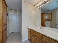 15230 Isabella Ct, Corpus Christi, TX 78418 - bathroom featuring vanity and baseboards