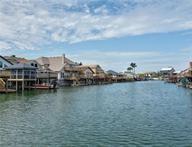 15230 Isabella Ct, Corpus Christi, TX 78418 - water view with a boat dock