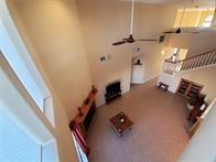 15230 Isabella Ct, Corpus Christi, TX 78418 - unfurnished living room featuring ceiling fan