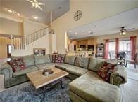 15230 Isabella Ct, Corpus Christi, TX 78418 - living area with ceiling fan and stairs