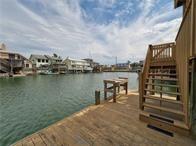 15230 Isabella Ct, Corpus Christi, TX 78418 - dock area featuring a water view and stairs