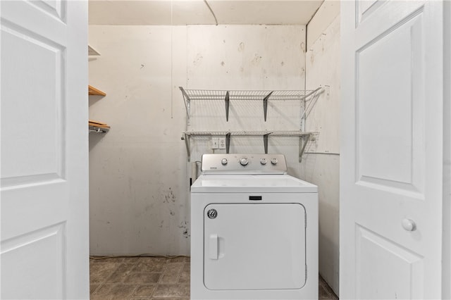 washroom with washer / clothes dryer