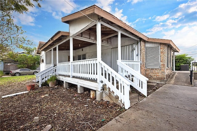 342 Davis Rd, Taft, TX 78390 - view of side of property with covered porch