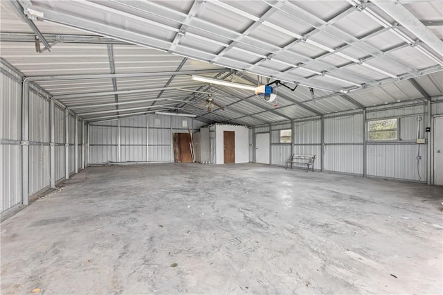 342 Davis Rd, Taft, TX 78390 - garage featuring a garage door opener and metal wall