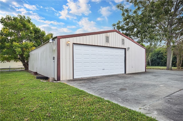 garage with a lawn